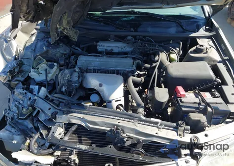 1999 Toyota Camry Le z USA, uszkodzony, nr VIN 4T1BG22K7XU449270